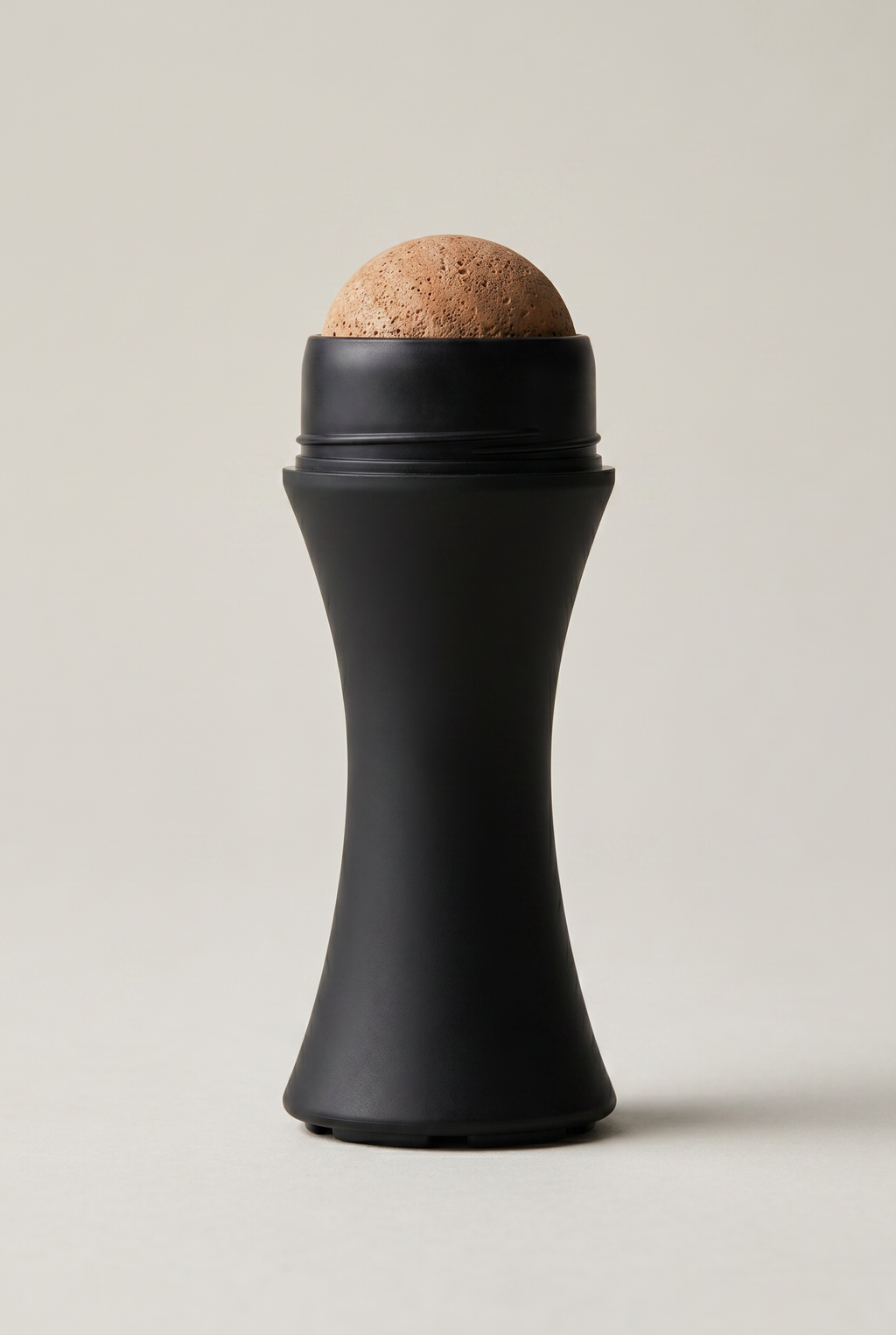 THEMATIQ volcanic stone oil-control face roller for men, matte black with natural tan stone tip