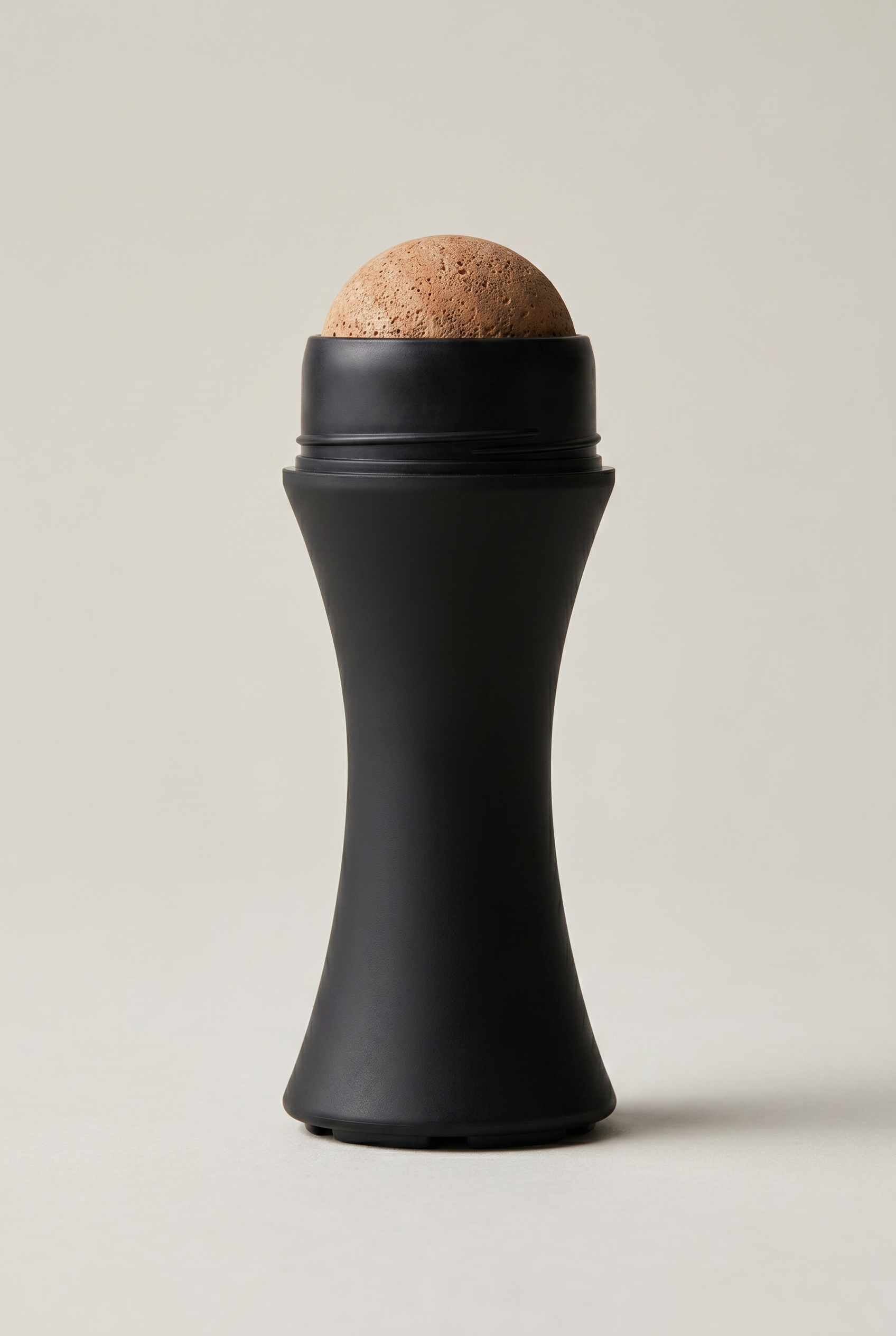 THEMATIQ volcanic stone oil-control face roller for men, matte black with natural tan stone tip